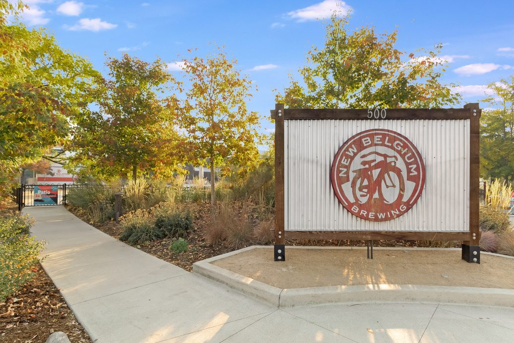New Belgium Brewing sign beside a walking path in Northeast Fort Collins
