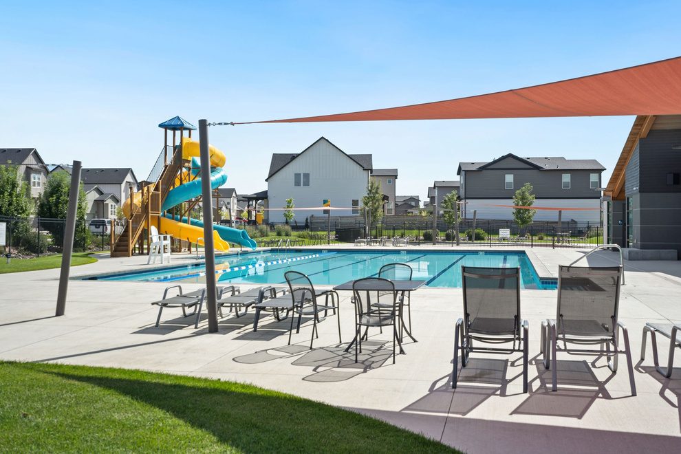Community pool and playground in a newer Timnath neighborhood